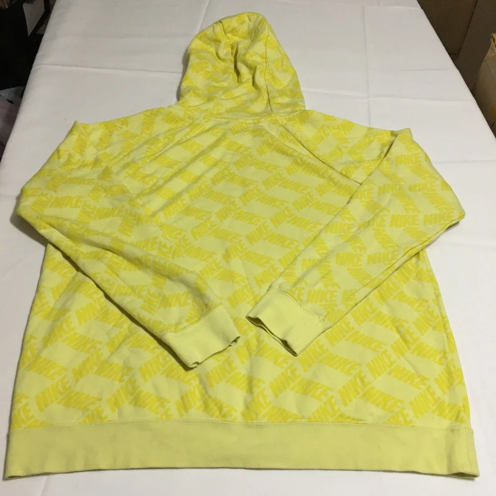 Nike Sportswear Essentials Pullover Hoodie Womens XL Yellow All Over Print Logo